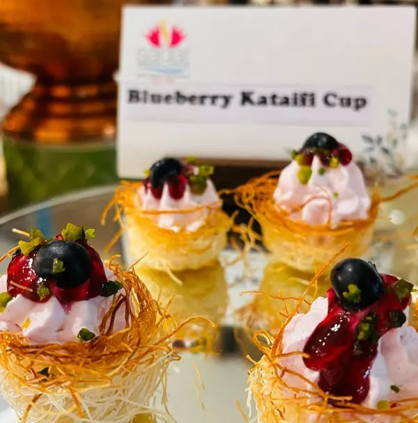 A twist on a Mediterranean classic, these are my Blueberry Kataifi Cups. The shredded pastry nests are filled with a light blueberry cream and topped with fresh fruit, offering a perfect balance of sweet and tart flavors.