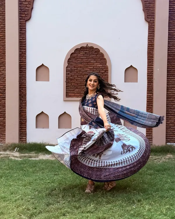 Twirling into Garba season! There's nothing like the flow of a beautiful lehenga during a Garba dance. This shot captures the vibrant and joyful spirit of our festive workshops.