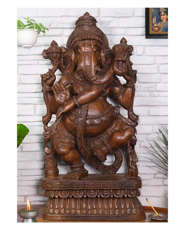 A 25-inch Mangalahara Ganapathi in a dynamic dancing pose, holding a lotus in his trunk. This form is considered highly auspicious for entrances and pooja rooms, bringing positive energy.