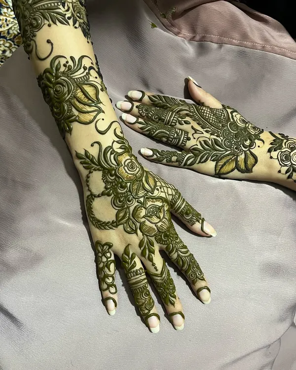 A lush, full-arm floral design where bold flowers and leaves create a beautiful, flowing pattern.