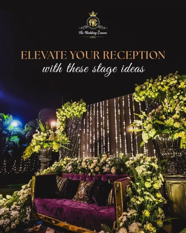 To elevate a reception, I combine dramatic florals with unique lighting. This stage features a lush arrangement of white and green flowers cascading over a plush velvet sofa, with a backdrop of sparkling light strings for a truly glamorous effect.