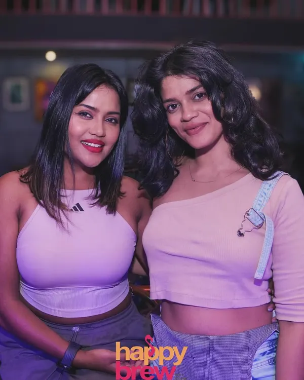 Posing with a friend during a fun karaoke night. I love the community that builds around these music events.