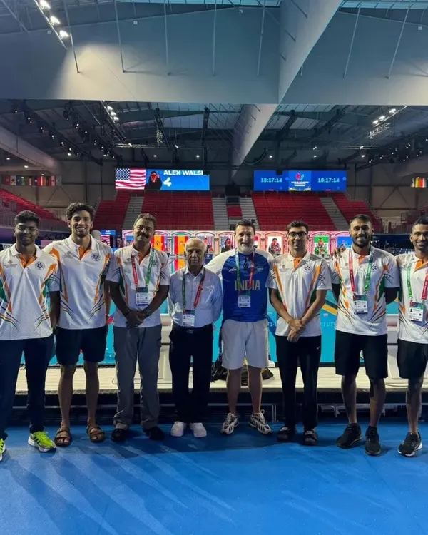 Team India, featuring our Dronacharya Awardee coach Pradeep Kumar and swimmer Shoan Ganguly, at the World Aquatics Swimming Championship in Singapore. We are proud to have our coaches and athletes leading the charge internationally.