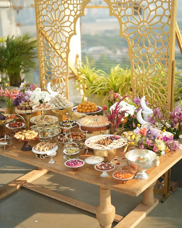 This is what we live for: creating breathtaking experiences that captivate all the senses. A stunning Iftaar grazing table we curated, set against a golden sunset, blending opulent decor with an abundance of flavors from mezze platters to traditional sweets.