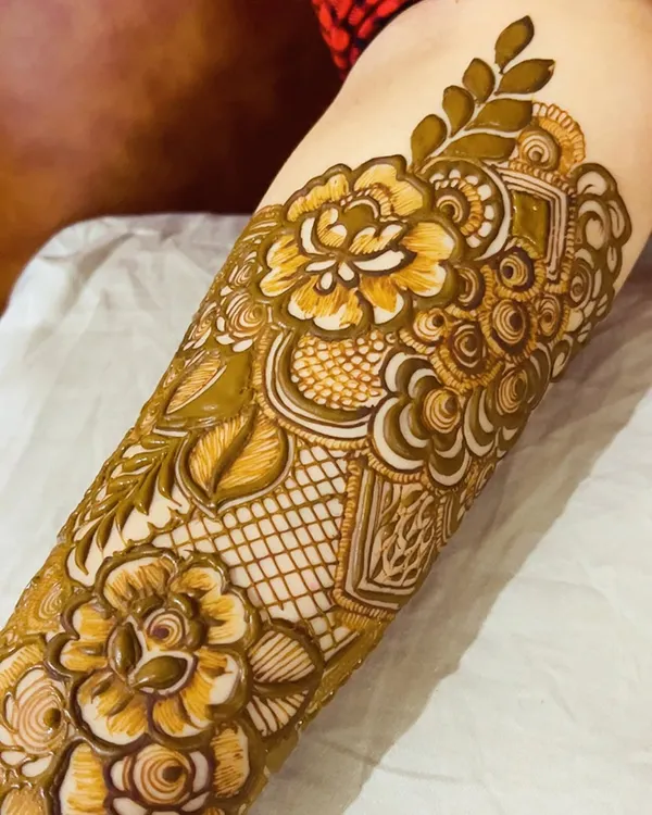 A close-up of my signature floral work, showing the fine lines and shading techniques that I teach in my specialized floral workshop.