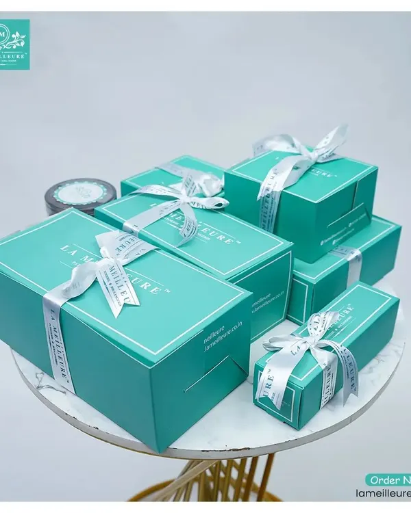 This is where the magic begins. Our signature teal boxes, available in multiple sizes, promise a luxurious unboxing experience for any occasion, from corporate gifting to personal celebrations.