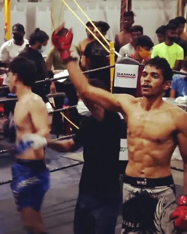 A throwback to my MMA fighting days. That feeling of having your hand raised in the ring is what all the hard work is for.