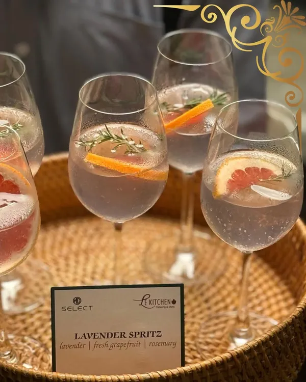 A truly great drink can set the tone for an entire evening. My Lavender Spritz, infused with fresh grapefruit and rosemary, is a signature cocktail designed to be both refreshing and elegant.