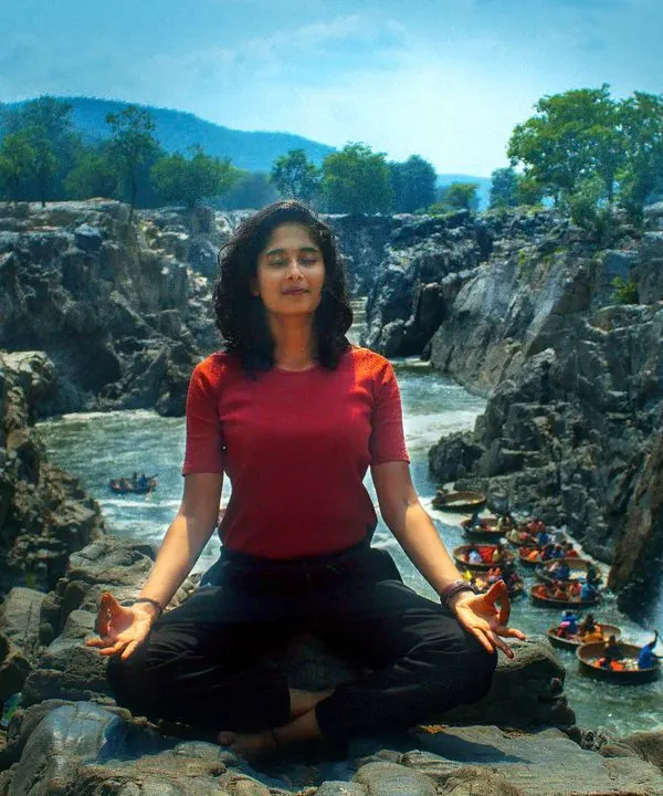 Finding complete serenity while meditating by a powerful waterfall. These are the moments of profound connection that my nature retreats are built around.
