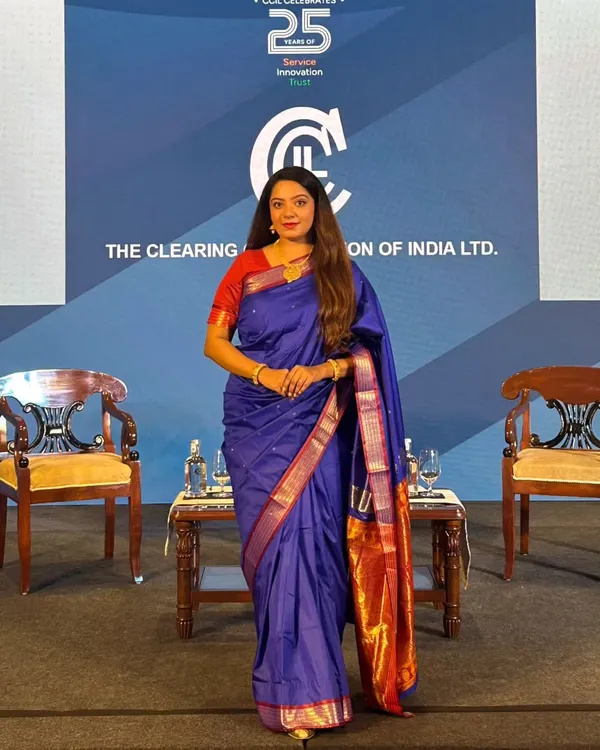 Posed shot on the stage set for the CCIL 25th-anniversary event. The setup included a formal seating arrangement for panel discussions with senior officials from the RBI and other financial institutions.
