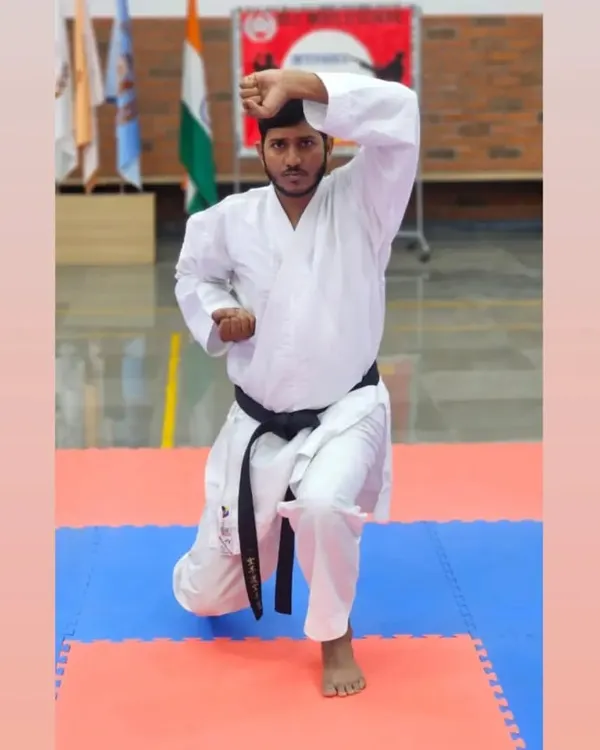 Believing in your goal is the first step. Here I am in a deep stance, demonstrating the focus and solid foundation required for both kata and kumite.