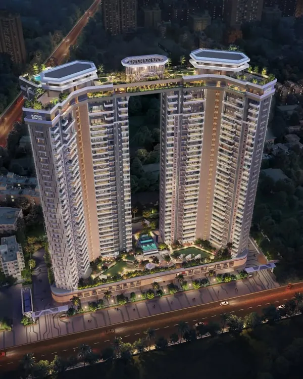 This aerial view captures the dramatic presence of our twin residential towers in Pune, connected by a signature sky bridge. The design creates a new landmark on the city skyline while offering residents unparalleled views and exclusive rooftop amenities.