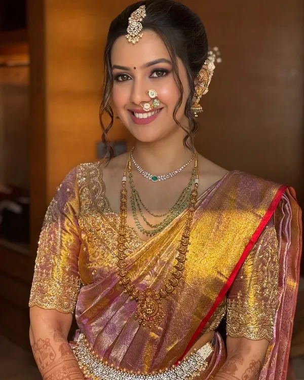 This is the essence of a royal Maharashtrian bride, a look we will master together in the course. This close-up shows the flawless HD makeup, soft contouring, and defined eyes that create a radiant glow, perfectly complementing traditional jewelry.