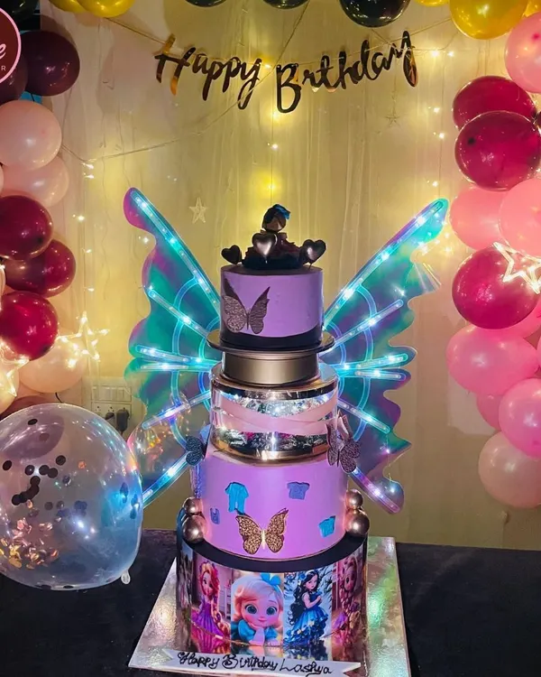 This is my viral electric butterfly wings cake, a true showstopper for any grand celebration. The multi-tiered design features glowing, iridescent wings and intricate details that create a magical centerpiece.