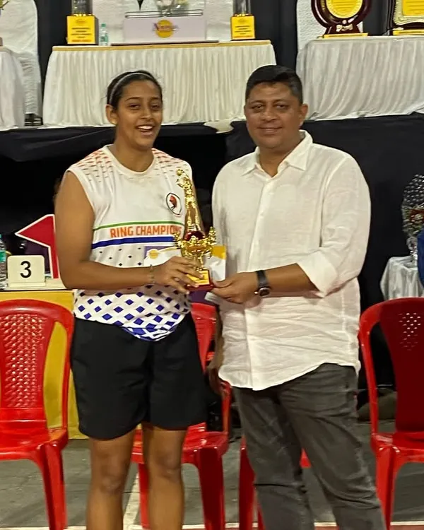 Presenting the MVP award to a deserving player from our champion Women's Team. Recognizing individual excellence is a key part of our events.