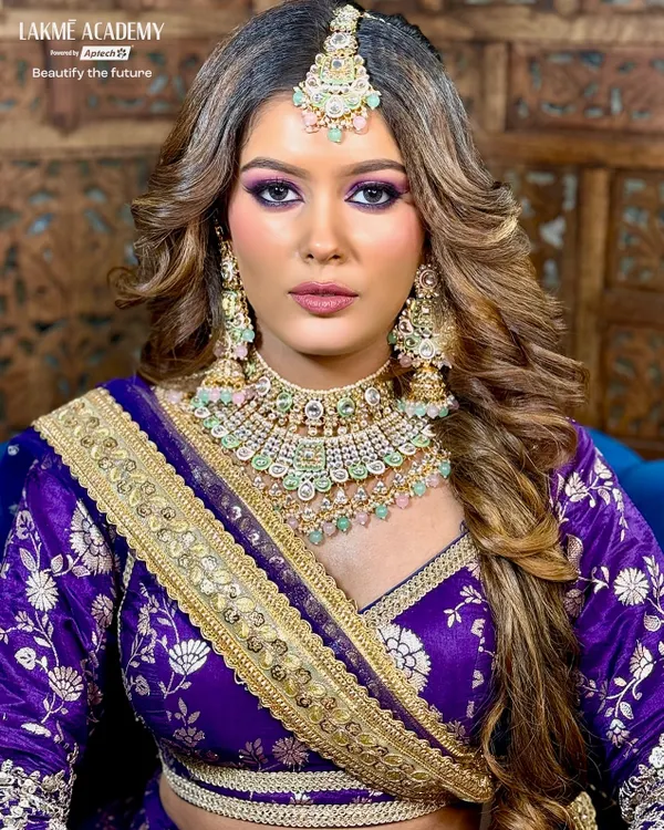 A stunning bridal look created at our academy. Our courses cover how to create bold, beautiful eye makeup that complements heavy traditional jewelry and outfits, a key skill for any professional bridal makeup artist.