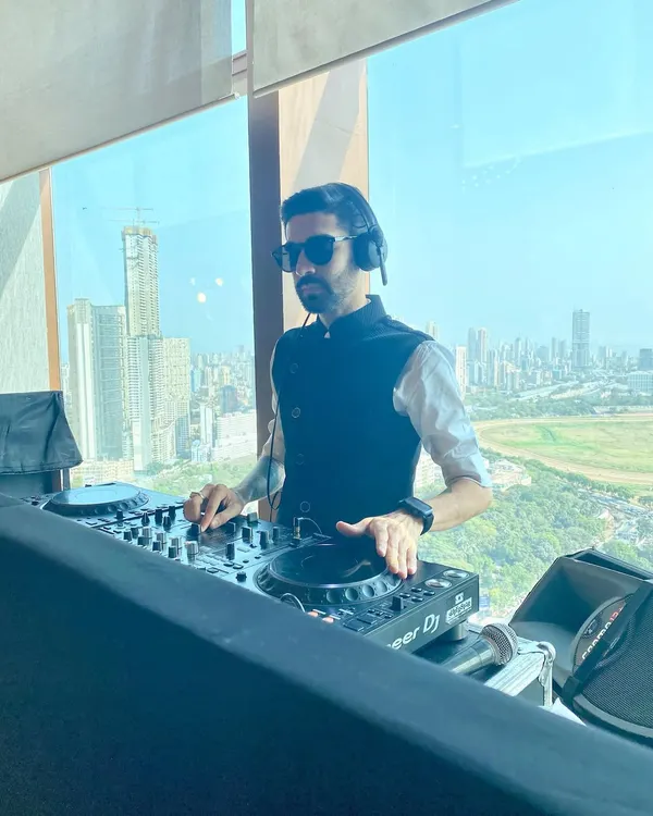 Playing a daytime set at a rooftop venue overlooking the city. For sundowner sessions, I curate a mix of deep house, afro tech, and commercial pop that creates a relaxed yet sophisticated atmosphere as the sun goes down.