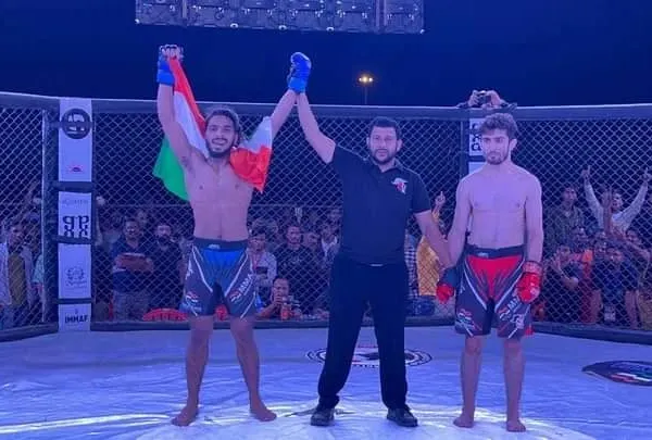 This is what we train for. Here I am after winning the main event by unanimous decision. Hard work in the gym pays off in the cage.