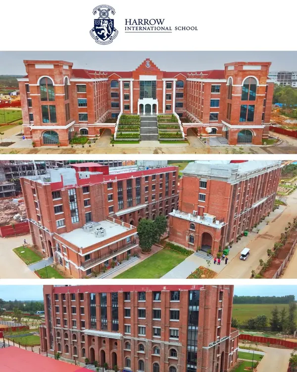 A clear, wide-angle aerial shot of the Harrow International School main building, showcasing its classic brick architecture and grand entrance.