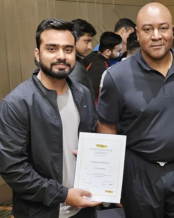 Receiving my Performance Training certification from the Technogym Wellness Institute, learning from master trainer Kyle Meadows.