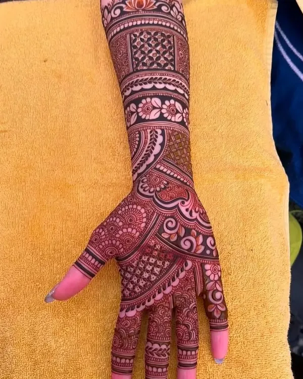 This photo shows the beautiful dark stain of a full-hand design. This is the rich color you can expect from my henna after it fully develops.