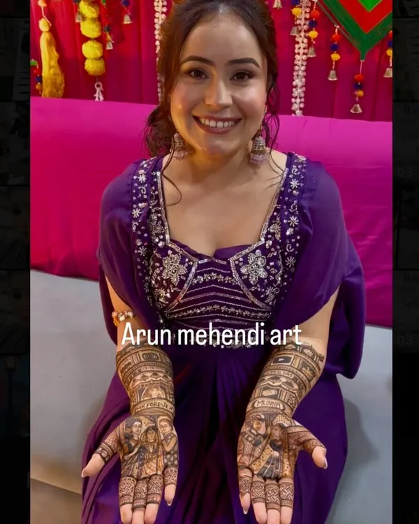 A happy bride proudly displaying her custom portrait mehendi. Her smile says it all!