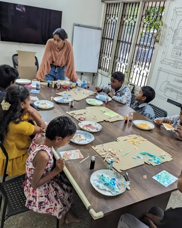 We believe the best way to learn is by getting your hands messy! Here, we're guiding a group of curious kids through a marble art experiment during a field trip to our lab. It's moments like these, full of focus and discovery, that are at the heart of everything we do.
