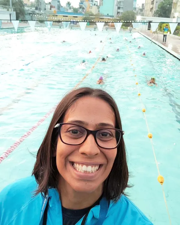 This is my 5:30 AM view, and I wouldn't trade it for anything. Behind me are the NMSA Marlins, our youth competitive team, putting in the work. They are learning about discipline, teamwork, and grit, lessons that will serve them long after they leave the pool.