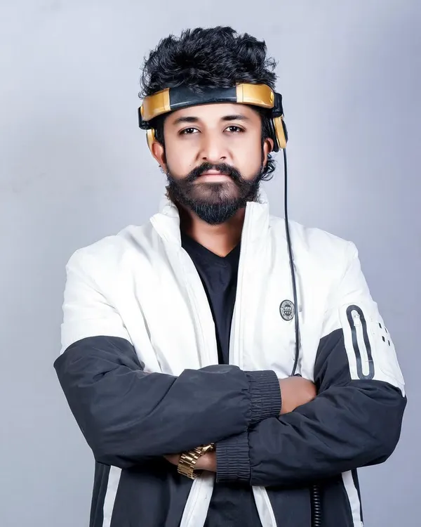 A professional portrait reflecting my focus and passion for music. I believe hard work and a love for the craft are the keys to a successful event.