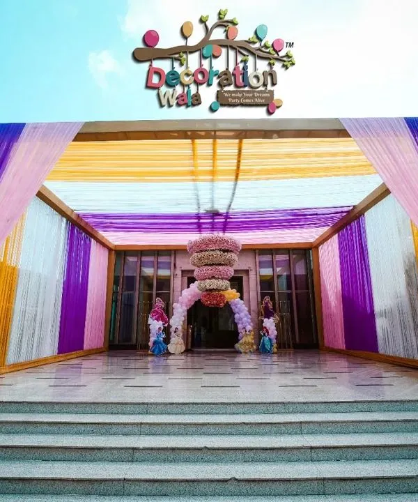 This was the grand entrance to Pravya's Cinderella-themed welcome party. I used colorful drapes and my "Decoration Wala" sign to create a festive gateway, with a small balloon arch hinting at the magic waiting inside.