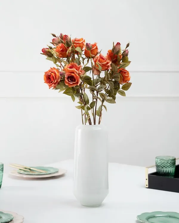 An elegant tablescape styled for a home decor brand. I used a clean, bright setting with green and gold accents to create a fresh and modern dining look, centered around the floral arrangement.