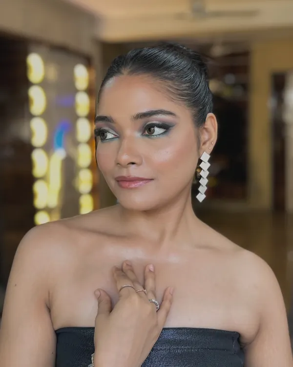 A classic, sultry smokey eye. This look is perfect for a cocktail party or a reception. I used deep black and grey tones, blended seamlessly for a dramatic effect, and paired it with a glossy nude lip to keep the focus on the eyes.