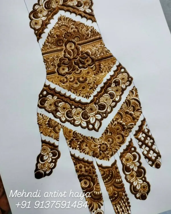 A practice sheet showcasing a full-hand bridal design with a beautiful chevron pattern. This is how I perfect complex layouts before applying them to the skin.