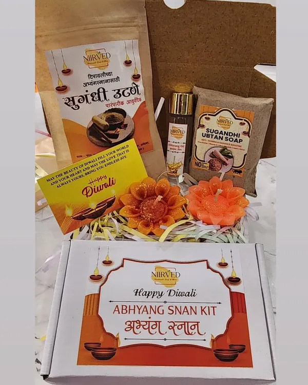 My signature Diwali Abhyang Snan Kit, containing everything for a traditional and rejuvenating holy bath. Inside the box, you'll find Sugandhi Utane, Abhyang Oil, Ubtan Soap, and two floating candles.