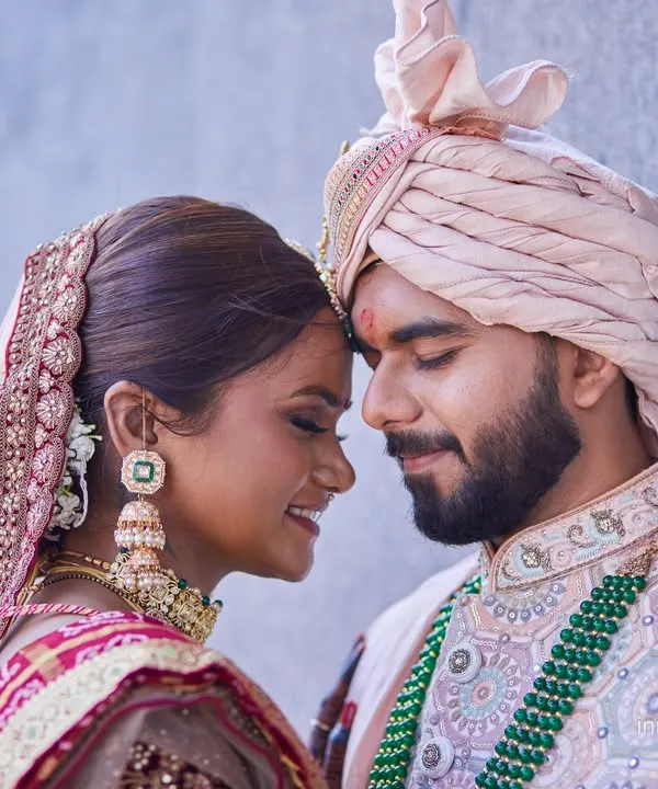 I believe the most powerful wedding photos are the quiet ones. This moment between the bride and groom, just before the ceremony, captures the calm and deep affection that is the foundation of their journey together.