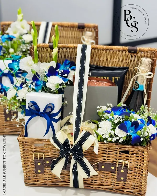This luxurious wicker hamper, overflowing with fresh flowers and curated gifts, represents the heart of my service. It’s more than a gift; it’s a grand gesture, perfect for celebrating life's most significant milestones and making a truly unforgettable impression.