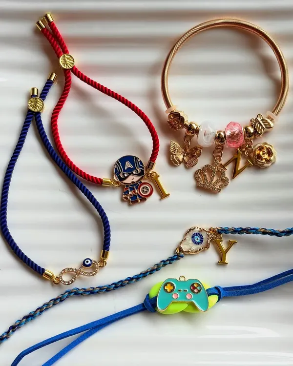 Celebrate the bond of siblinghood with our hand-curated Rakhis. We have a variety of designs, from quirky character rakhis for kids to elegant initial rakhis for adults.