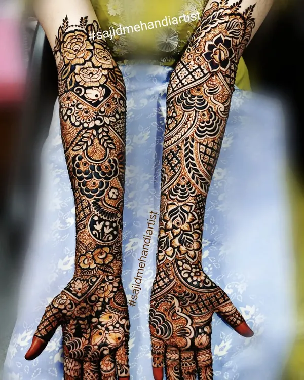 This is the level of full bridal mehandi you can learn to create. I teach you how to compose and execute these highly intricate, full-arm designs, layering traditional patterns with bold, clean lines to achieve a stunning result for your clients.