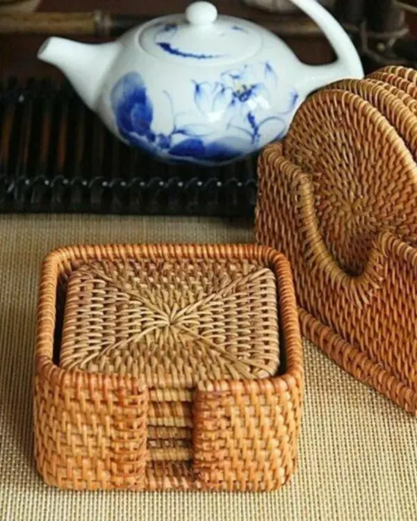 Our handcrafted cane coasters, available in both square and round shapes. Each set comes with a matching holder, providing a stylish and natural way to protect your surfaces from drink rings.