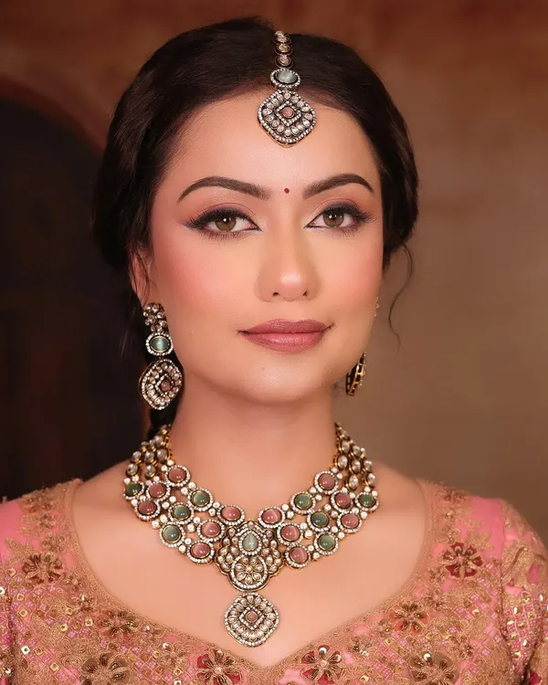 This is the essence of my artistry, a look I call 'Sundar'. It’s about creating flawless, radiant skin and defining the eyes with a classic winged liner, allowing your natural beauty to be the focus. This is a perfect example of a timeless engagement or reception look.