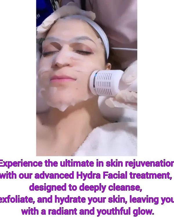 A client experiencing the deep cleansing and hydrating vortex of our popular HydraFacial. This treatment removes impurities while infusing the skin with nourishing serums for an instant, radiant glow.