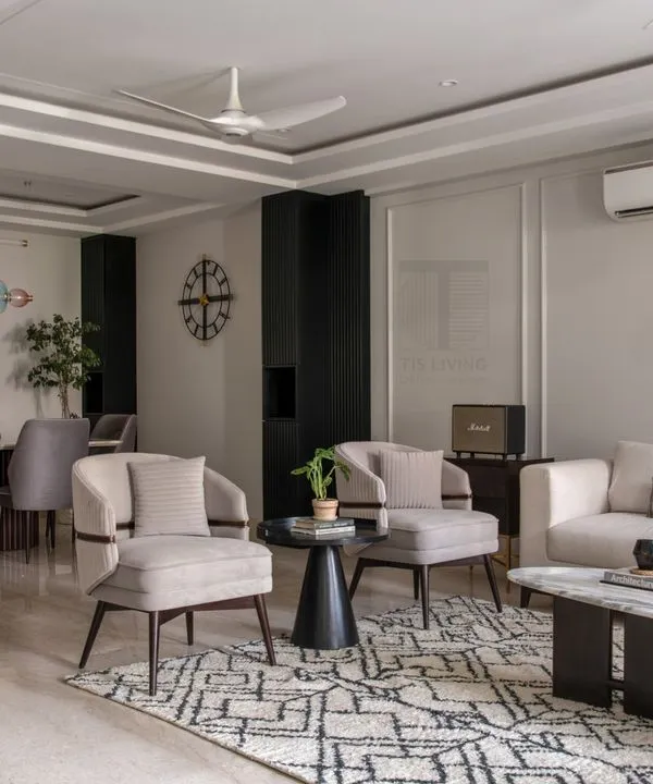 Inspired by clean Scandinavian design, we created this calm and neutral drawing room. The space features our custom-made sofa, armchairs, and a marble-top coffee table, all designed to create a harmonious and tranquil atmosphere.