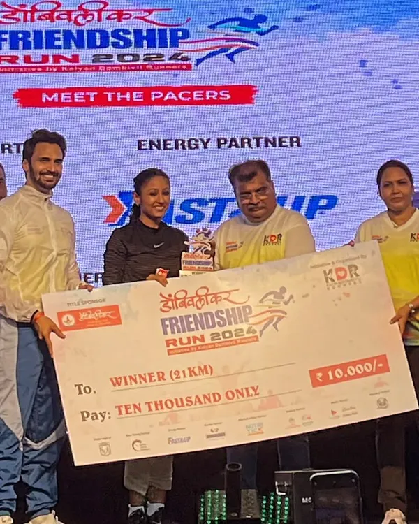 Securing first place in the Dombivali Friendship Run 21k. It's an amazing feeling to stand on the podium, holding the prize for a race well run.