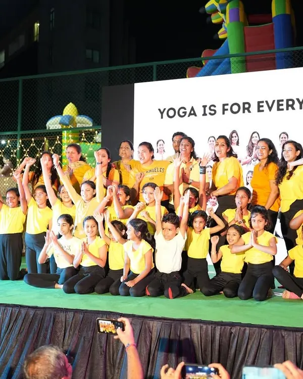 Glimpses from one of my best experiences, leading a large group of young yogis on stage. The banner says it all: "Yoga is for Everyone."