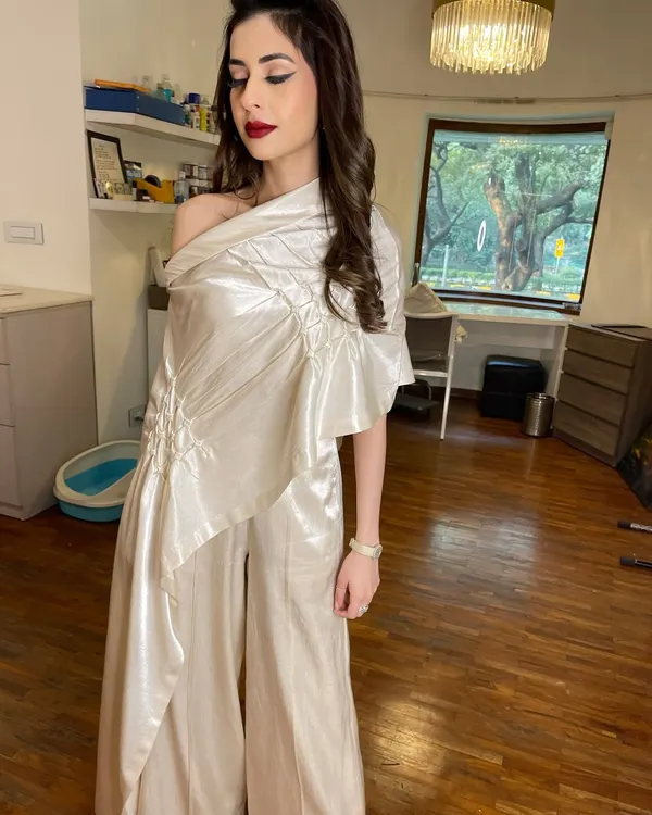 A classic and chic look perfect for a day brunch or elegant evening event. I created a flawless base, a sharp winged liner, and a bold red lip that makes a timeless statement.