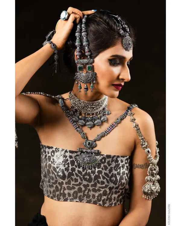 This look was for an oxidised silver jewellery campaign. I paired the heavy, tribal-inspired pieces with a dramatic black smokey eye and a deep red lip to create a fierce and powerful editorial look.