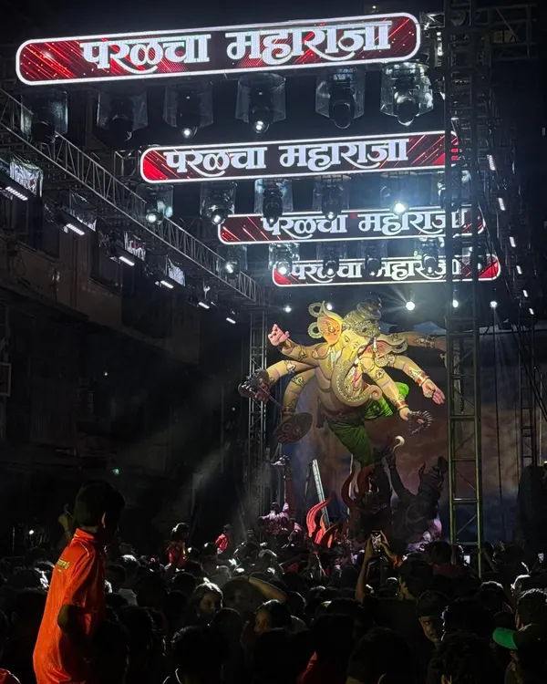 This is the kind of grand arrival I create for Mumbai's biggest festivals. For Parelcha Maharaja, I designed a massive truss and LED setup that filled the entire street, ensuring the balancing idol's Aagman Sohala was a spectacular sight for the massive crowd.