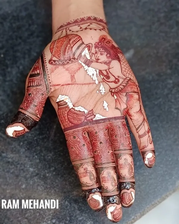A portrait of Krishna as Makhan Chor for the festival of Janmashtami. I use fine lines and shading to bring these divine figures to life on the palm.