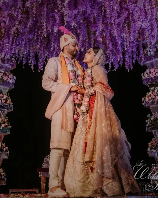 A mandap that feels like a purple dream. This setup at a Goa wedding features a stunning cascade of wisteria under which the couple exchanged their vows, showing my commitment to creating unique and romantic atmospheres.
