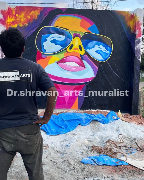 This vibrant, colorful graffiti portrait on an exterior wall is designed to grab attention and bring flavor to a restaurant's dining experience. Come for the art, stay for the food!